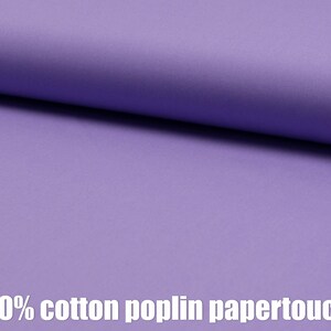 以下が含まれることがあります： 滑らかで薄い紫色の布のクローズアップ。布は100％コットンポプリンペーパータッチです。