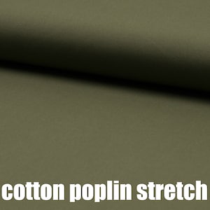 May include: Close-up of a dark green cotton poplin stretch fabric. The fabric has a smooth, slightly textured surface.