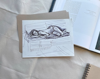 May include: A black and white line drawing of a person lying on a couch. The drawing is done in a loose, expressive style.