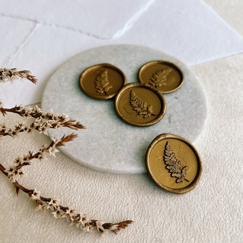 Gold wax seal with leaf design