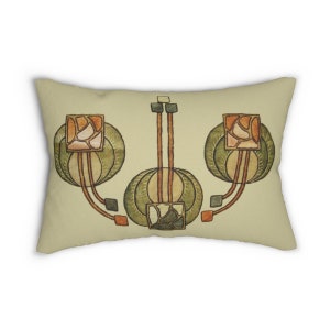 May include: A decorative pillow with a geometric design in shades of green, brown, and orange. The design features stylized flowers and leaves.