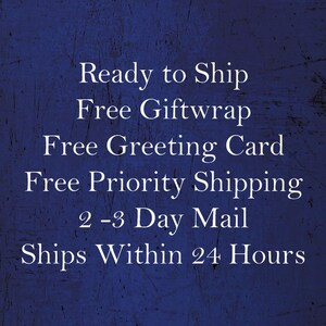 May include: Text on a blue background that reads: Ready to Ship, Free Giftwrap, Free Greeting Card, Free Priority Shipping, 2-3 Day Mail, Ships Within 24 Hours.