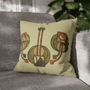 May include: A decorative throw pillow with a beige background and a stylized floral design in shades of green, brown, and orange. The design features three stylized flowers with geometric shapes and lines.