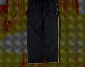 NIKE Pantalones de chándal Negro/Neón - L