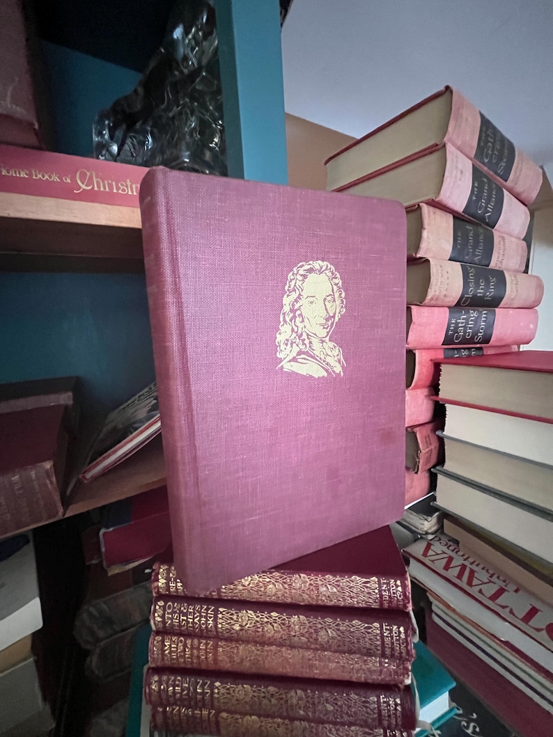 May include: A set of three ceramic mugs with a speckled, matte finish. The mugs are in shades of cream, light gray, and dark gray. Each mug has a simple, minimalist design and a rounded handle.