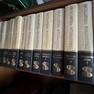 Vintage encyclopedia, Encyclopedia international, Home decor, Beautiful color, Home staging