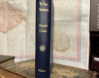 The three musketeers by Alexandre Dumas, faux leather, 1950s