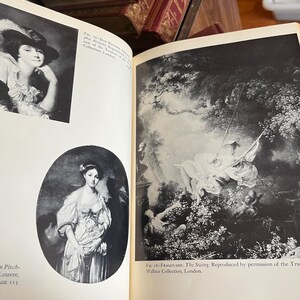 May include: Open book with black and white reproductions of classic paintings. One image is a portrait of a woman in a hat, the other depicts a scene of figures on a swing. Text includes "Louvre" and "Wallace Collection, London."