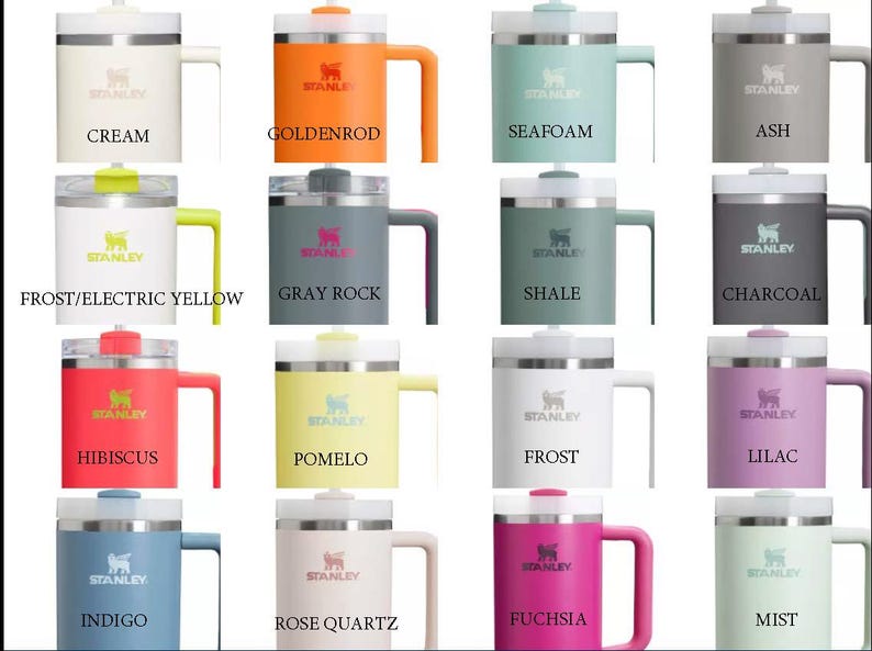 May include: Twelve different colour variations of a stainless steel travel mug with a handle. The mug has a lid with a drinking spout and a clear plastic lid. The mug is labelled "Stanley".