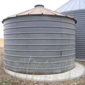 14’ diameter reclaimed grain bin roof and 3 rings for repurposing