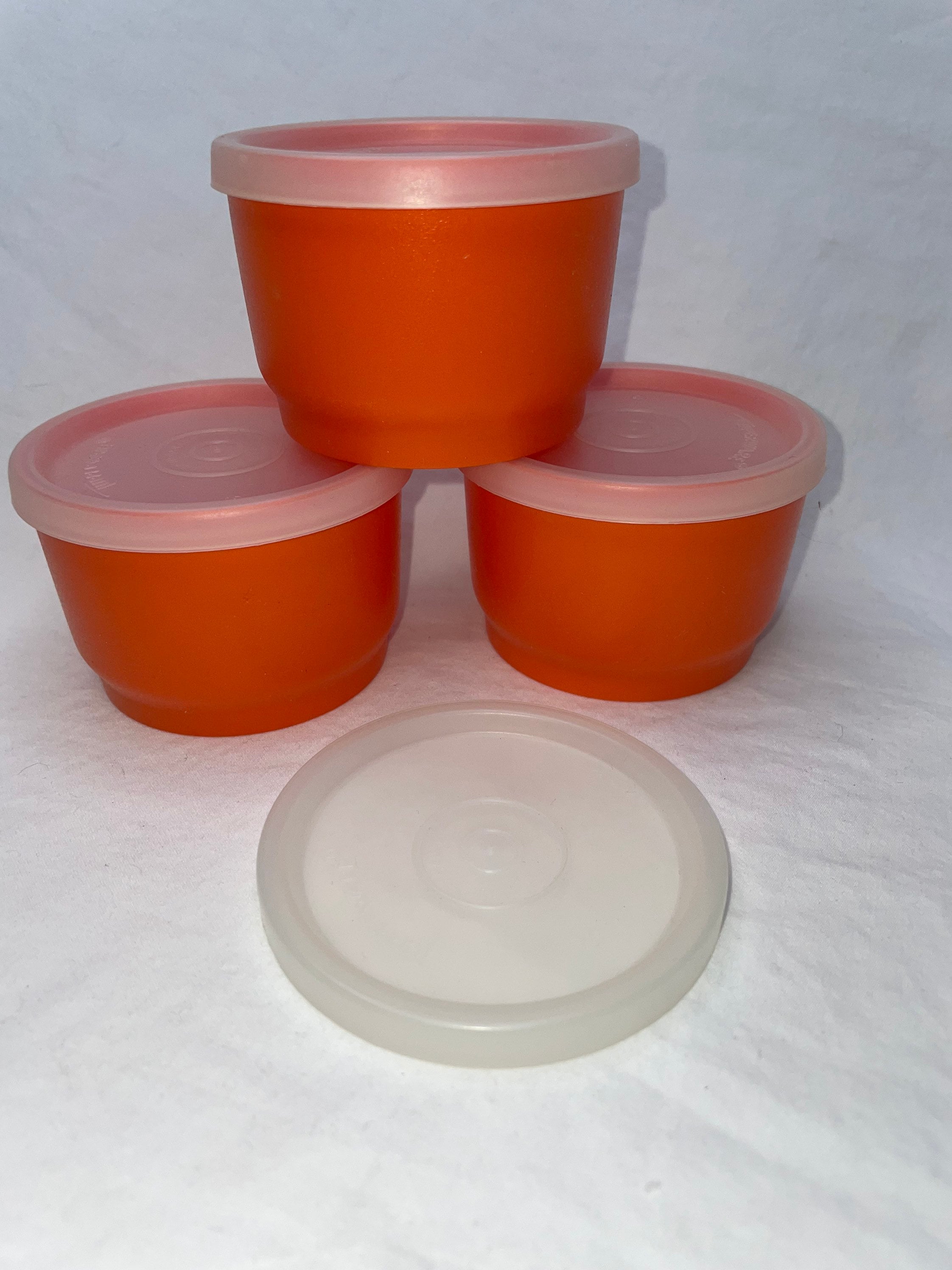 Vintage set of 4 orange Tupperware 2 snack cups small containers