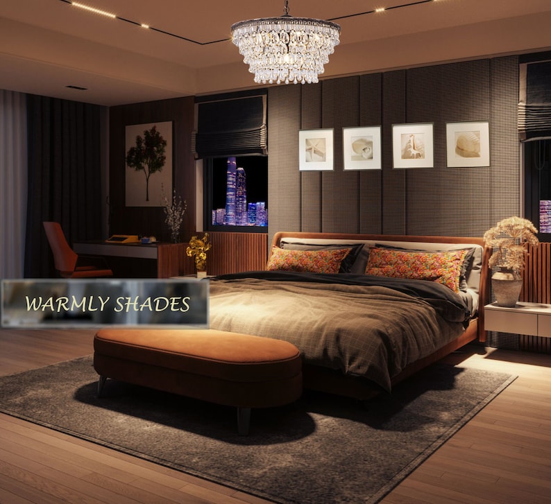 May include: A bedroom with a large bed, a brown ottoman, and a crystal chandelier with a black metal frame. The bed has a brown comforter and patterned pillows. The room has a dark wood floor and a rug.