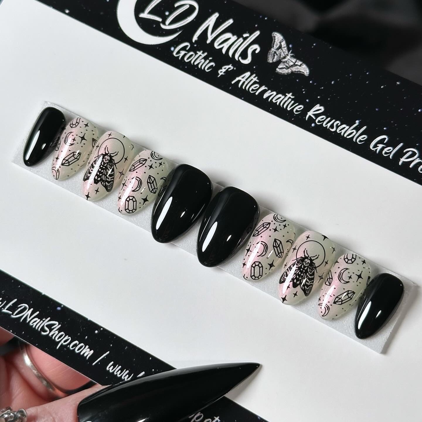 Bold Black Moth-Inspired Faux Nails