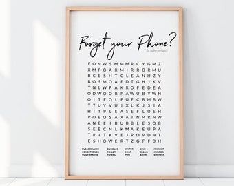 May include: A printable wall art poster with a black and white word search puzzle. The title of the puzzle is "Forget your Phone?" and the words to find are related to bathroom items.