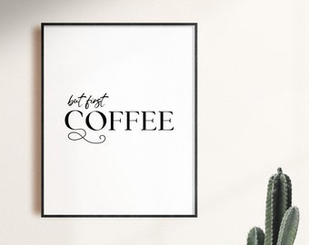 Puede incluir: Impresión enmarcada en blanco y negro con el texto "but first COFFEE" en una fuente cursiva.