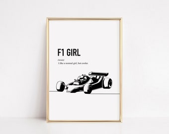 May include: A framed print with a gold border features the text "F1 GIRL" above a definition and a black and white illustration of a Formula 1 race car. The artwork is on a white background.