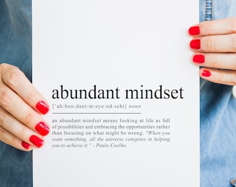 May include: A white printable poster with the definition of an abundant mindset. The definition reads: "an abundant mindset means looking at life as full of possibilities and embracing the opportunities rather than focusing on what might be wrong. "When you want something, all the universe conspires in helping you to achieve it." - Paulo Coelho"