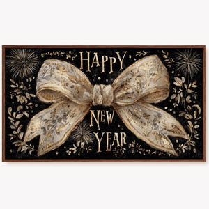 May include: A rectangular print with a black background and a large, ornate bow in shades of gold and white. The words "HAPPY NEW YEAR" are written in gold script above and below the bow. The print is framed in a dark brown border.