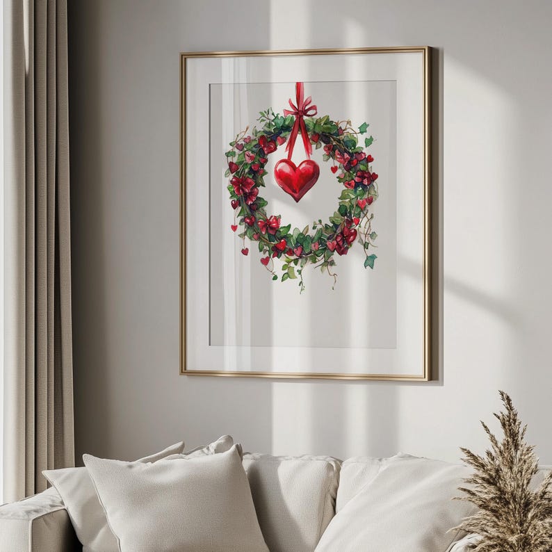 May include: A watercolor painting of a red heart hanging from a green wreath with red berries. The wreath is hanging on a white wall in a gold frame.