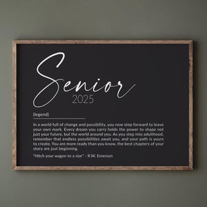May include: Black and white typography print with the word "Senior" and the year "2025" in a cursive font. The print includes a quote about the future and a caption that reads "(legend)".