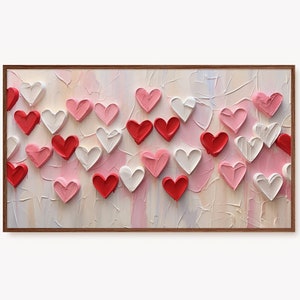 May include: A framed painting with a textured background of white, pink, and light blue. The painting features a collection of red, pink, and white hearts.
