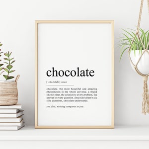 May include: A printable wall art print with a minimalist design featuring the word "chocolate" in bold black text with a definition underneath. The definition reads: "chocolate, the most beautiful and amazing phenomenon in the whole universe. a friend like no other, the solution to every problem, the answer to every question, chocolate doesn't ask silly questions, chocolate understands. see also: nothing compares to you."