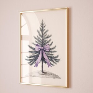 May include: A framed watercolor painting of a Christmas tree with a purple bow. The tree is green and the background is white.