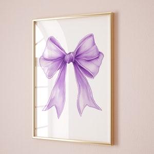 May include: A framed print of a large purple bow with a white background.