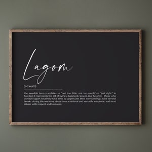 May include: Black and white typography print with the Swedish word "Lagom" defined as "not too little, not too much" or "just right". The print explains that the concept of Lagom represents a balanced, slower, low-fuss lifestyle.