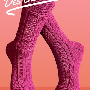 May include: A pair of vibrant fuchsia-colored knitted socks. The socks feature intricate cable and openwork patterns. The text "Des chaussettes" is written in white cursive across the top of the image.