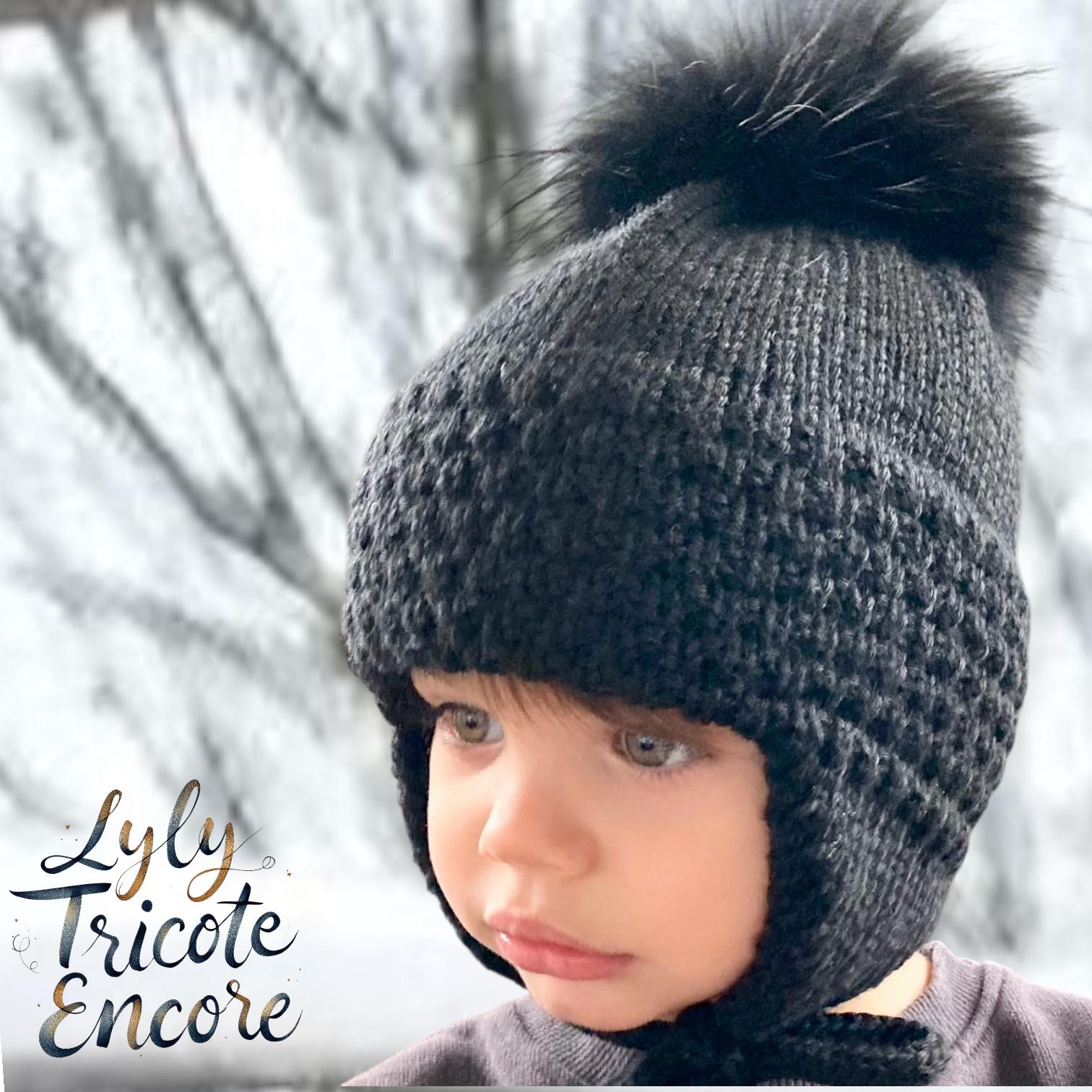 Bonnet tricot torsadé uni marine doublé avec pompon
