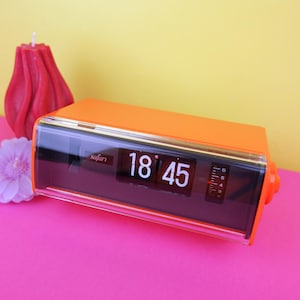 Vintage orange 1970s flip clock, electronic tabletop alarm clock, mid century 70s retro space age decor