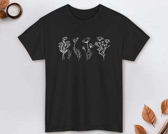 Camiseta minimalista con arte lineal de flores silvestres