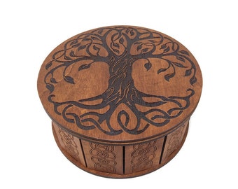 A small round casket in the Celtic style. Tree of life. Celtic gift