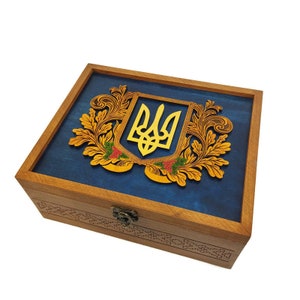 Ukrainian gift box. Ukrainian emblem. Handmade from Ukraine. Ukrainian trident. Engraving in embroidery style