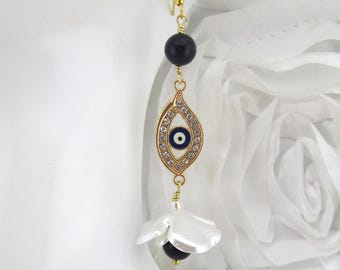 Pendientes de ojo turco y cuentas de piedra dorada azul