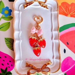 Girly Strawberries bag charm.