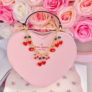 Strawberries and Cherries girl purse charm.
