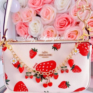 Strawberry girl purse charm.