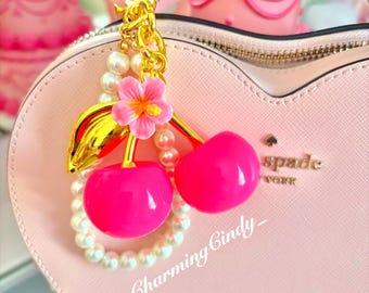 Hot pink cherry blossom and pearls bag charm.