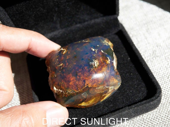 Blue Amber Freeform Cabashon From Sumantra, Indonesia Blue Amber Freeform Cabashon From Sumantra, Indonesia