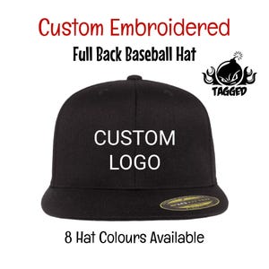 May include: Black baseball cap with a custom logo embroidered on the front. The text "CUSTOM LOGO" is embroidered in white thread. The hat is available in 8 colours. The hat is a full back style.