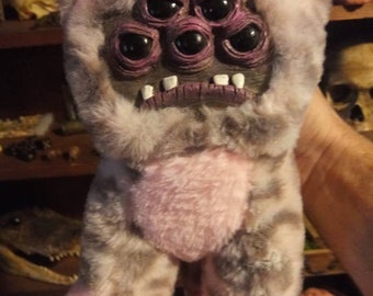 creepy teddy bear with teeth