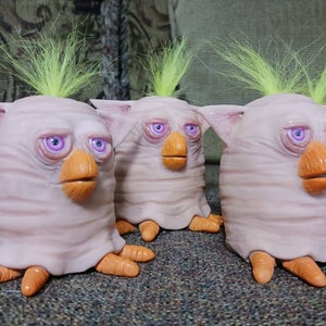 Forbidden Furb hairless Furby sculpture