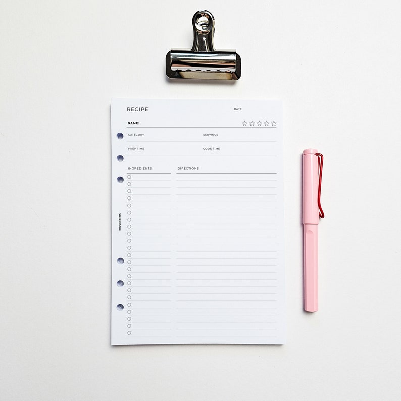 a clipboard with a notepad attached to it