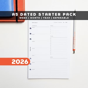 May include: A5 dated starter pack planner with a white weekly and monthly layout. The planner includes the year 2026, with sections for schedule, goals, and to-do lists. A pen rests on the right side of the planner.