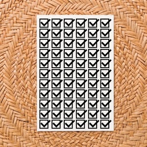 May include: A rectangular white card featuring a grid of sixty black square checkboxes, each containing a black checkmark. The grid is arranged in ten rows and six columns, with every single box marked as completed with a bold black checkmark.