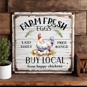 May include: A white wooden sign with black text that reads 
