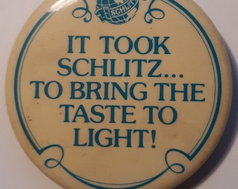 Vintage Schlitz beer advertising pin