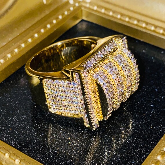Iced out gold best sale ring
